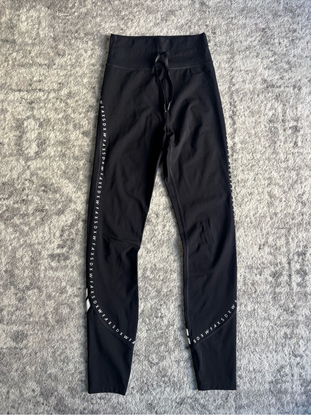 White Fox Boutique Black High-Waist Performance Leggings with Side Logo